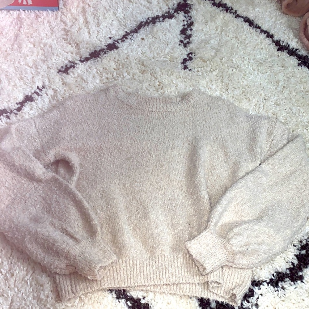 Cream sweater.